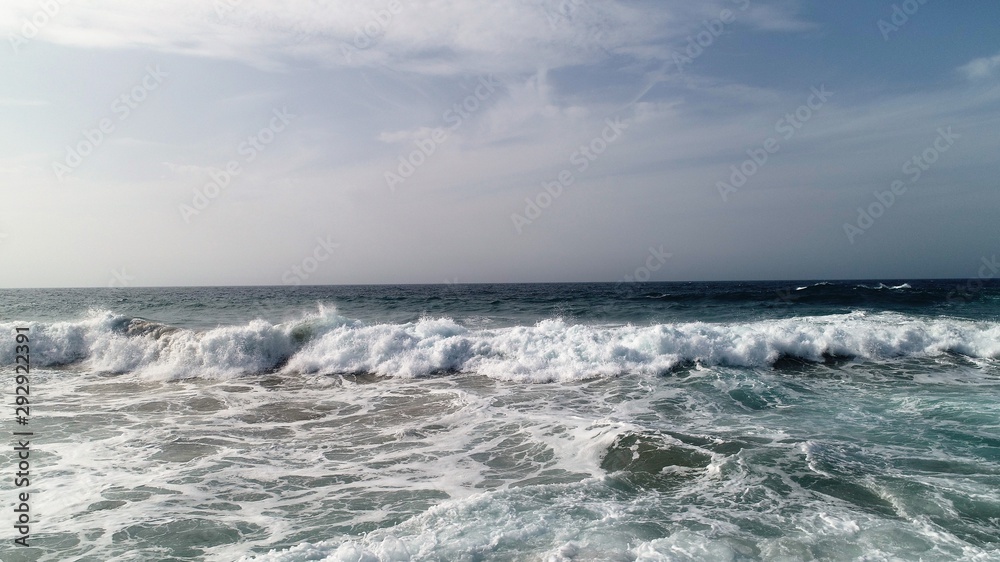 landscape and sunset on the Atlantic coast watching the breaking of the waves