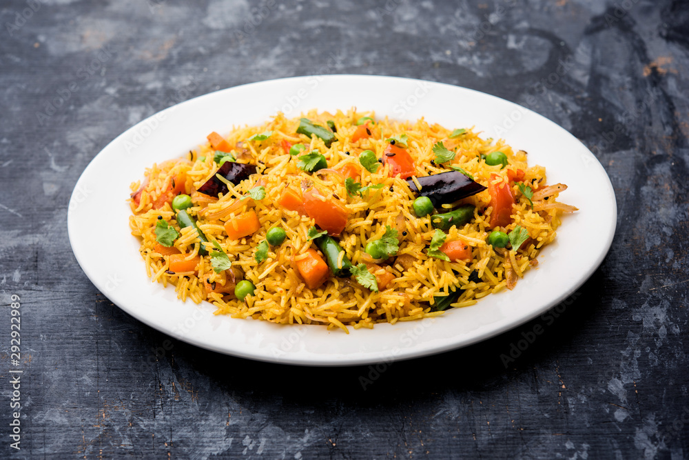 Tawa Pulao/Pulav/Pilaf/Pilau is an Indian Street Food made using basmati rice, vegetables and spices. Selective focus Tawa Pulao/Pulav/Pilaf/Pilau is an Indian Street Food made using basmati rice, vegetables and spices. Selective focus