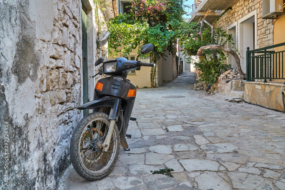 Motorbike in side street in Greece