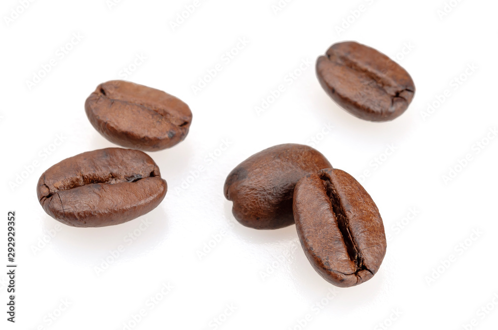 Grains of coffee on a white background. Grains of coffee on a white background.