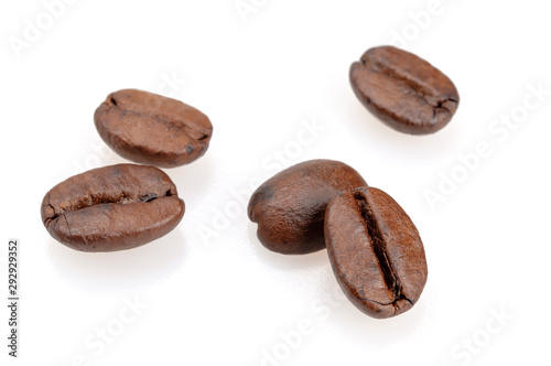 Grains of coffee on a white background.