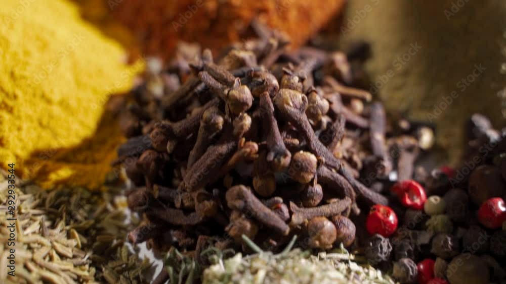 Spices. Various Indian Spices on wooden table. Assortment of Seasonings, condiments. Cooking ingredients, flavor.