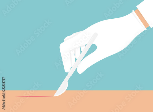 Hand with white glove on holding scalpel and making a small cut on a skin colored surface. Surgery concept