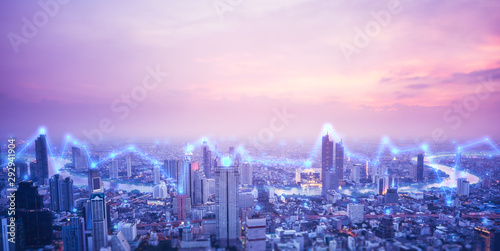 Digital network connection technology concept. Bangkok city at sunset