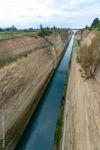 Old waterway in Greece, Corinth  Canal connects the Gulf of Corinth with the Saronic Gulf in the Aegean Sea, tourist attraction © barmalini