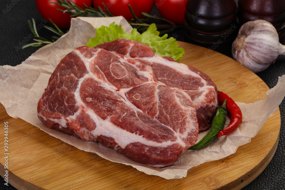 Raw pork neck steak