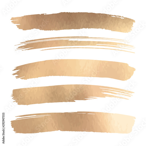 Set of gold foil watercolor brush strokes isolated on white. Metallic golden ink splashes