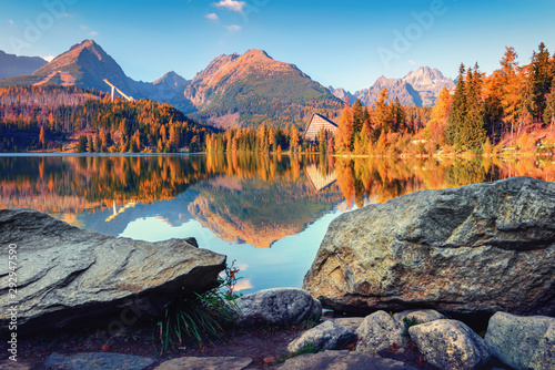 Mountain lake Strbske pleso (Strbske lake) in autumn time. High Tatras national park, Slovakia photo