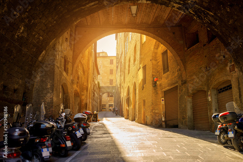 Panorama of an old street in an Italian city at dawn, Siena. Italy photo