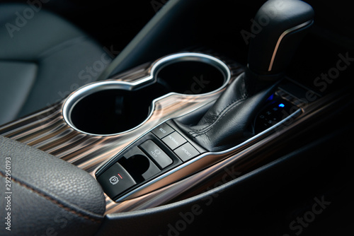 Modern centre console with gear shift, car  driving mode and auto break hole system © magneticmcc