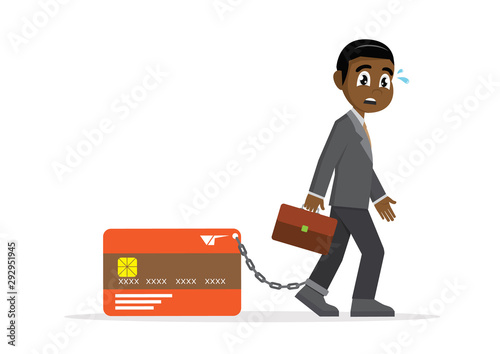 African businessman with foot chained to bank credit card.