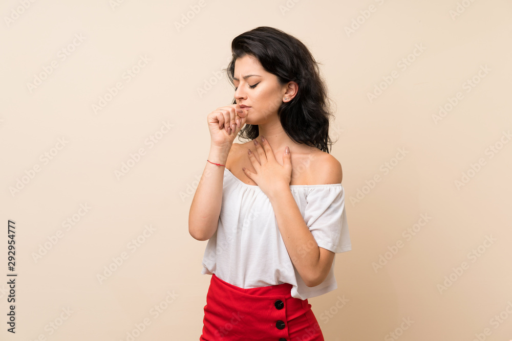 Young woman over isolated background is suffering with cough and feeling bad Young woman over isolated background is suffering with cough and feeling bad