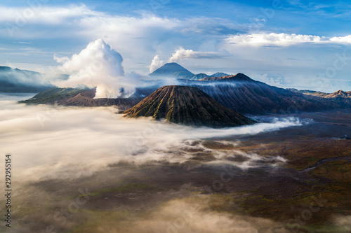Morning clouds surrounding Mount Bromo at sunrise, East Java, Indonesia.