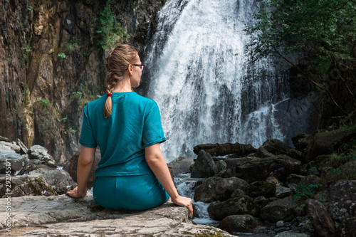 Woman at Korbu Waterfall on...