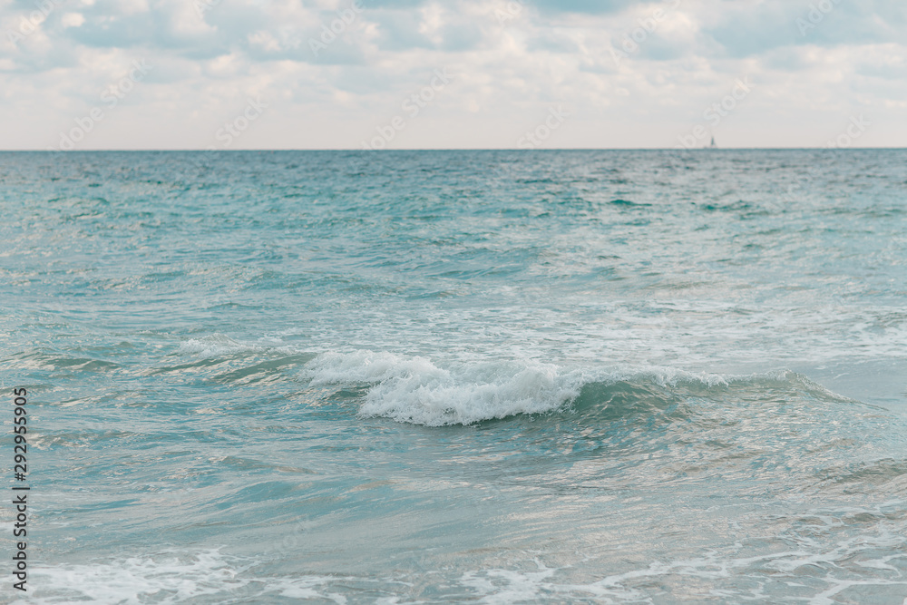 Obraz premium Abstract blue sea water with white foam for background, nature background concept