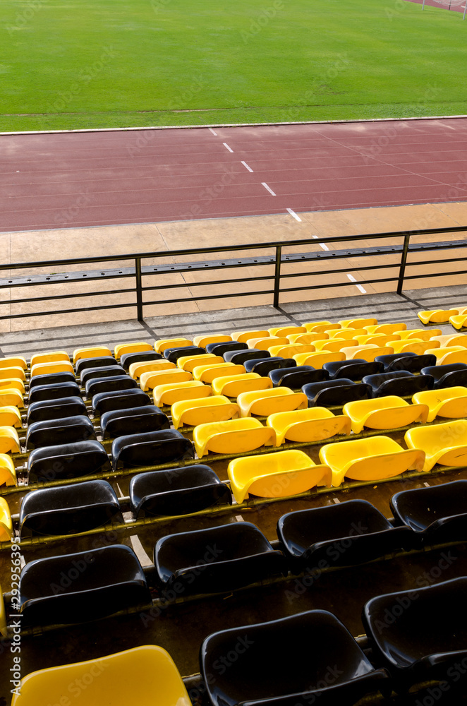Fototapeta premium The sport seat grandstand in an empty stadium.