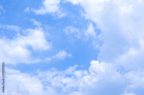 International airplane fly transportation on blue sky beauty cloud