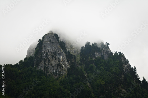 Clouds rising from mountain...