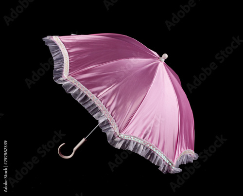  pink umbrella on black background