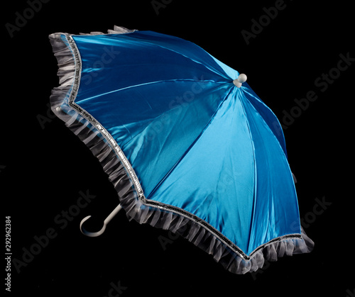 blue  umbrella on black background