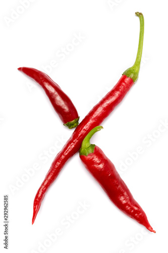 English alphabet made of chili peppers on white background. Font made of hot red chili pepper isolated - letter X.