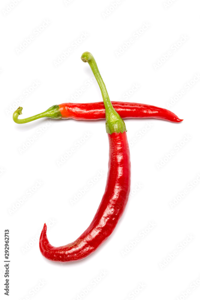 English alphabet made of chili peppers on white background. Font made of hot red chili pepper isolated - letter J. English alphabet made of chili peppers on white background. Font made of hot red chili pepper isolated - letter J.