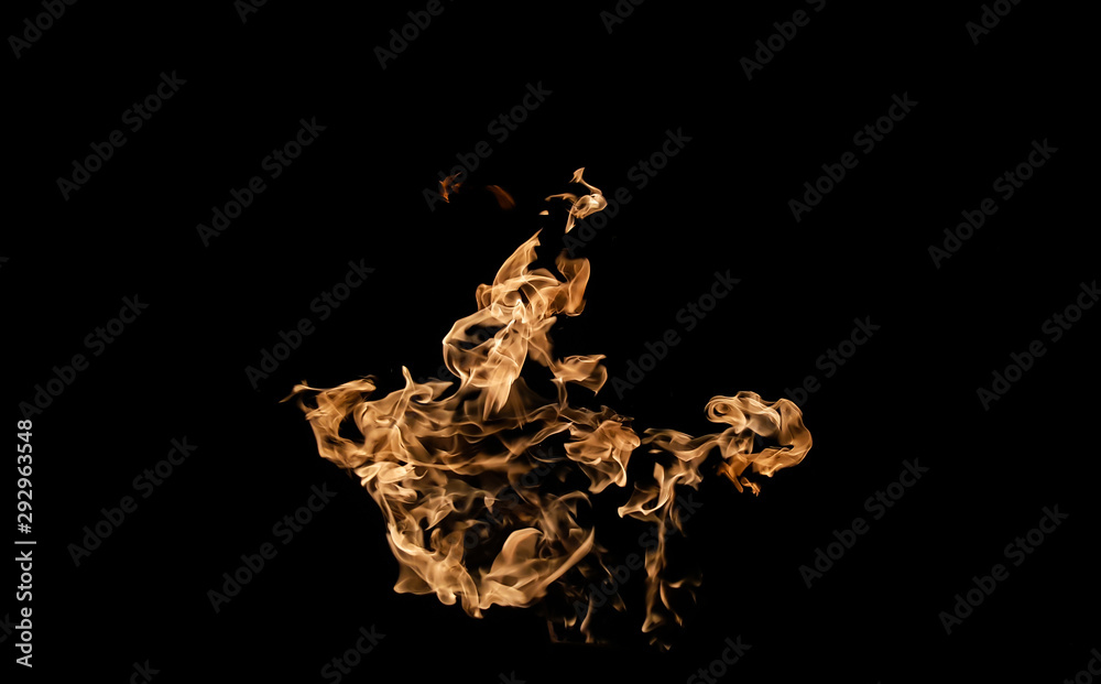 Fototapeta premium Fire flames on black background. fire on black background isolated. fire patterns