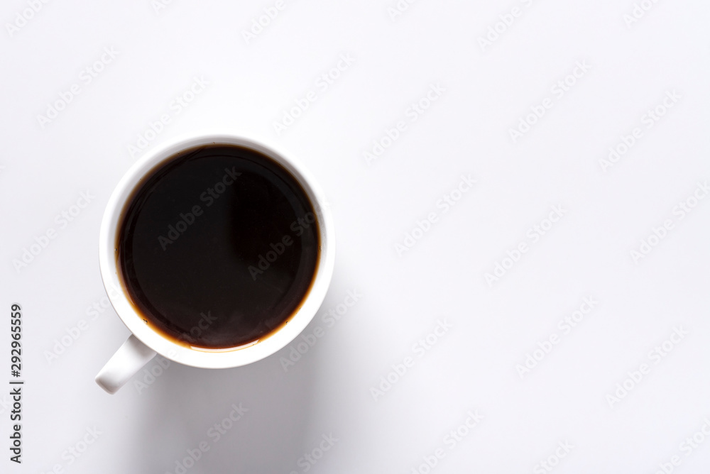 Espresso coffee in a white cup on a grey background, top view, copy space, flat lay. Espresso coffee in a white cup on a grey background, top view, copy space, flat lay.