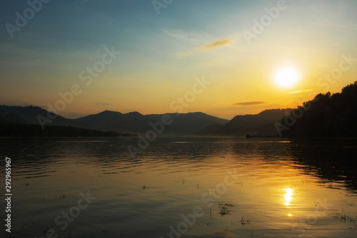 Sunset on Teletskoye lake in Altai mountains, Siberia, Russia. Drone shot.