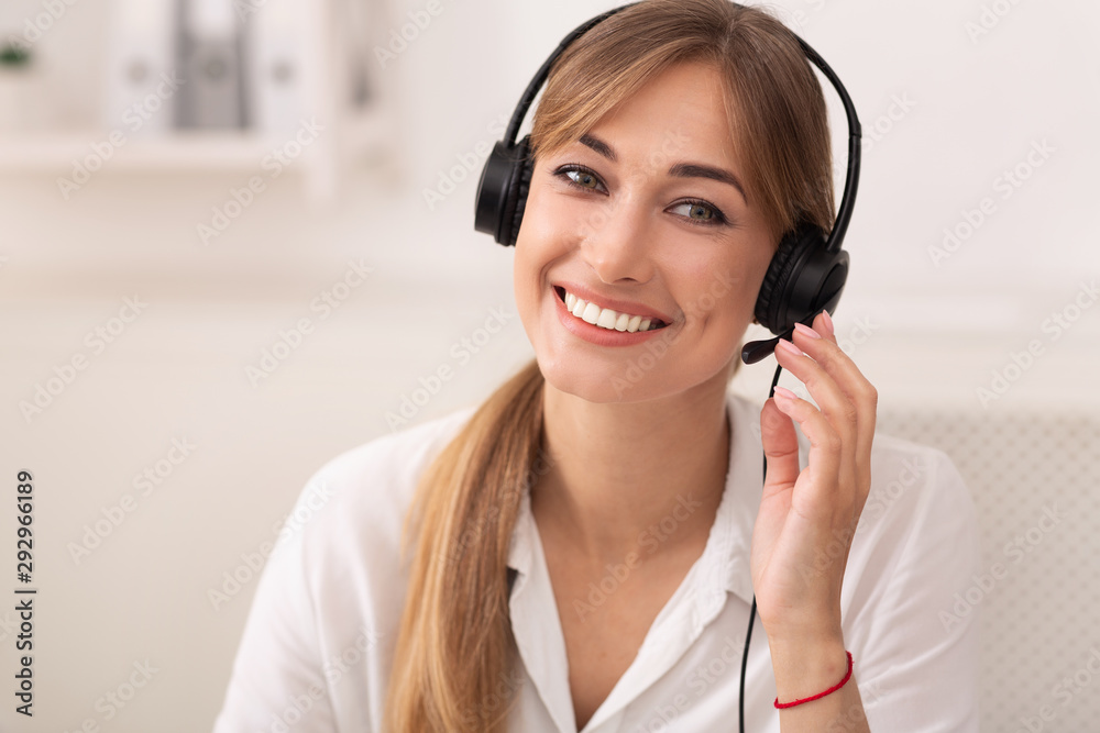 Smiling Woman In Headset Working In Call Center Office Smiling Woman In Headset Working In Call Center Office