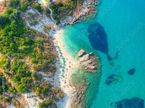 Spectacular aerial view of a beautiful beach bathed by a clear and turquoise sea in Greece. Whale shape in sea from rocks. Xigia Sulfur
