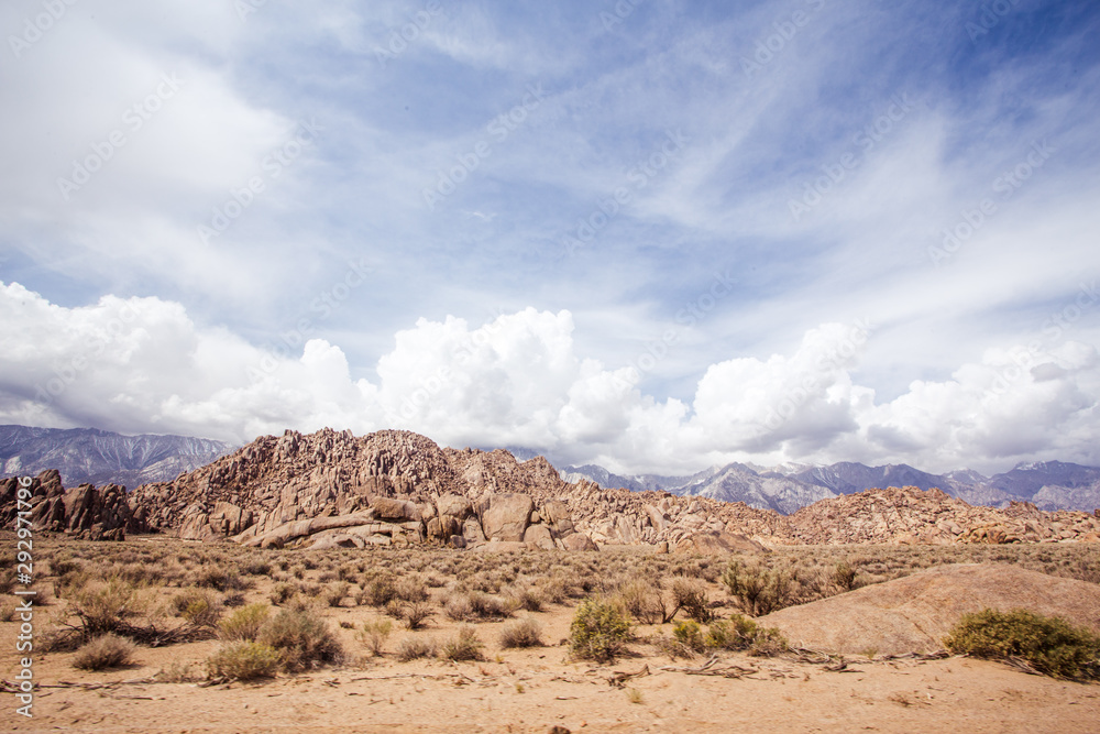 Desert landscape with mountains in the distance Desert landscape with mountains in the distance