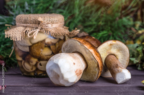 Mushroom Boletus in wooden wicker basket. Boletus edulis over Wood Background, close up on rustic table. Cooking delicious organic mushroom. Gourmet food,Autumn Cep Mushrooms. Mushrooms Picking