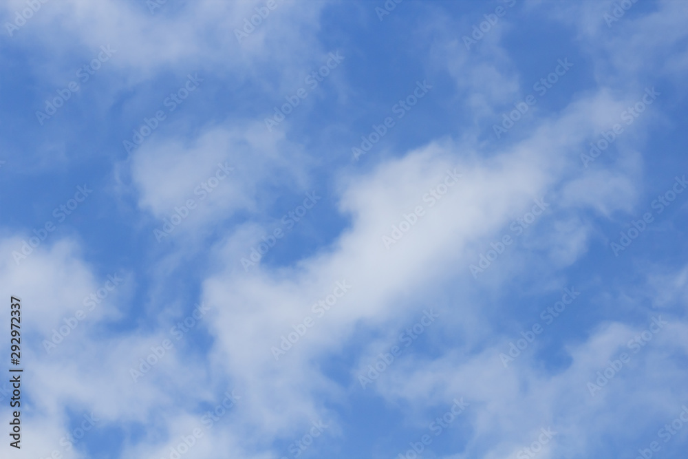 Blue sky with white clouds as background