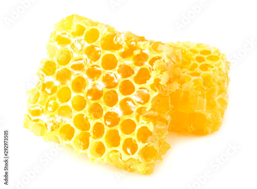 Honeycomb with honey isolated on white background