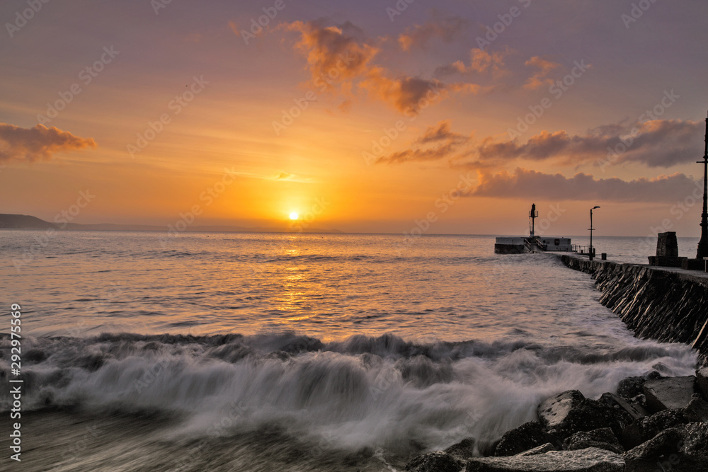 Sunrise at the Banjo Pier & Looe Beach Looe Cornwall