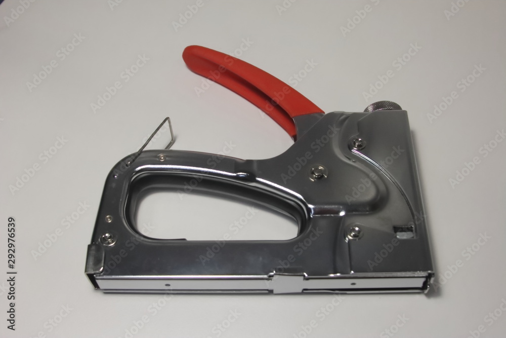  Construction stapler on a white background