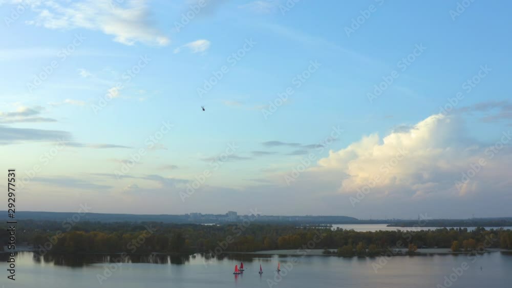 The helicopter flights over the beautiful city river The helicopter flights over the beautiful city river