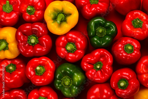 Fresh red, green, yellow bell pepper background.