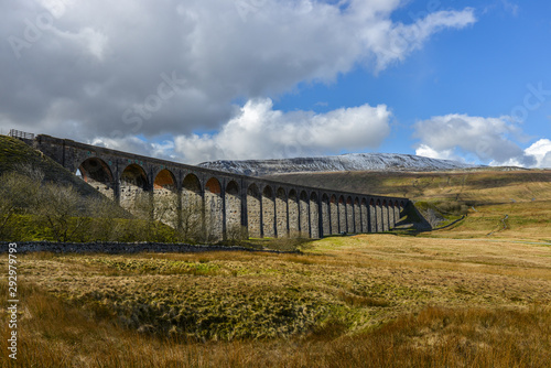 Ribblehead Viaduct with a dusting of snow on Whernside in the background