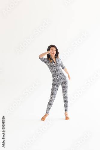 Latino dance, Improvisation, contemporary and vogue dance concept - young beautiful woman dancing on white studio background