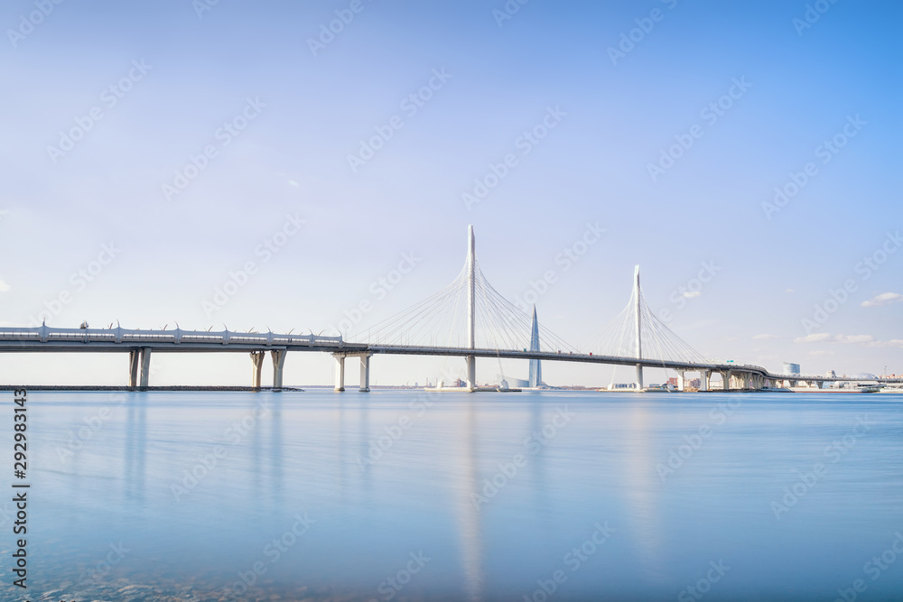 Seascape in Saint Petersburg with cable-stayed bridge and distant skyscraper