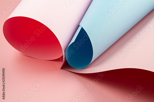 Abstract backgroud of rolled textured paper sheets of different shades