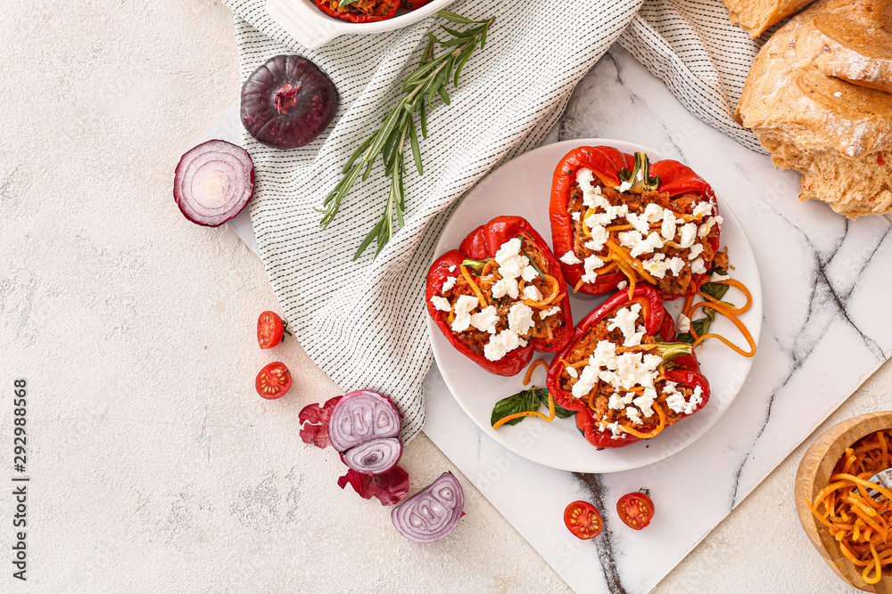 Plate with tasty stuffed pepper on table Plate with tasty stuffed pepper on table