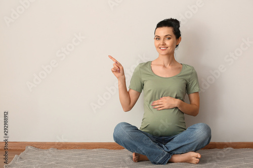Beautiful young pregnant wo...