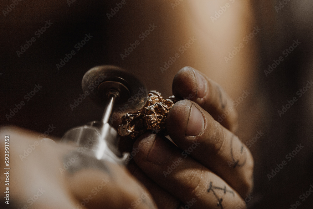 Jeweler working at workshop Jeweler working at workshop