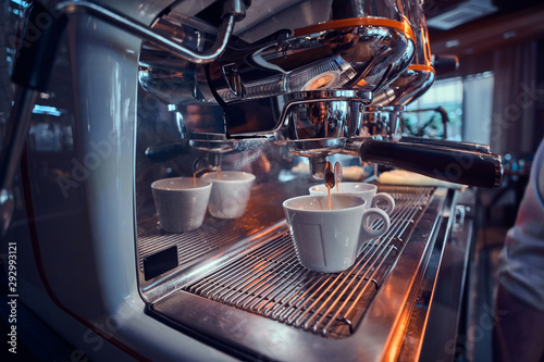 Canvastavla New shiny coffee machine at coffee shop is ready to start making coffee