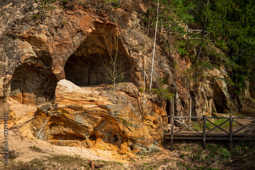 Sandstone Caves in Ligatne, Latvia. Caves with  old wooden doors. photo