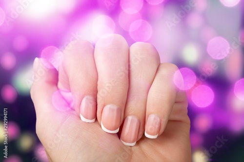 Beautiful woman's nails with beautiful french manicure