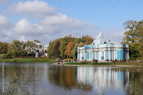 Russia, St. Petersburg, September 28, 2019, Catherine Park. The picture shows the grotto pavilion in Tsarskoye Selo against the backdrop of an autumn park with red leaves